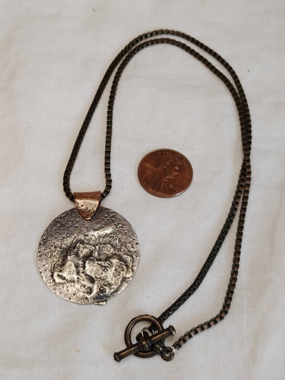 Artisan Sterling Silver “Cuento Largo Corto” Face Pendant Necklace
